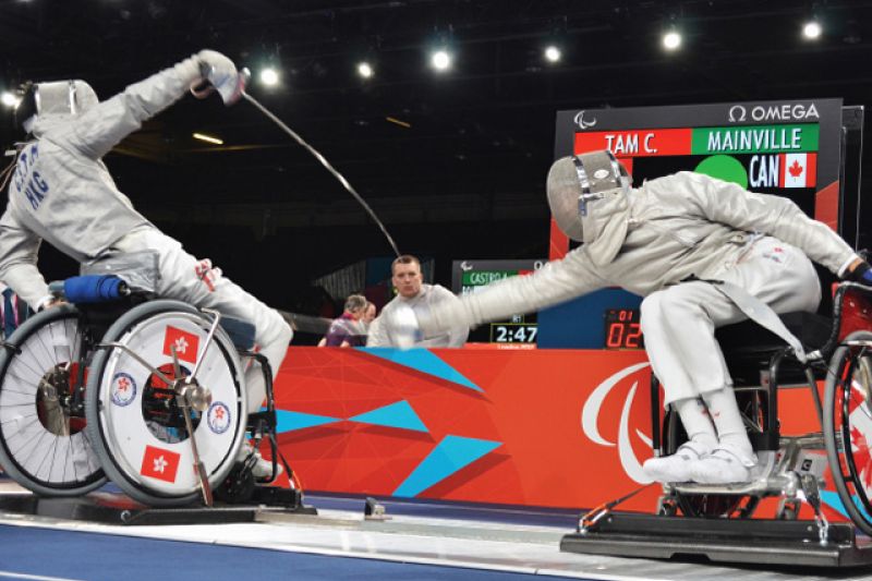 two wheelchair fencers competing