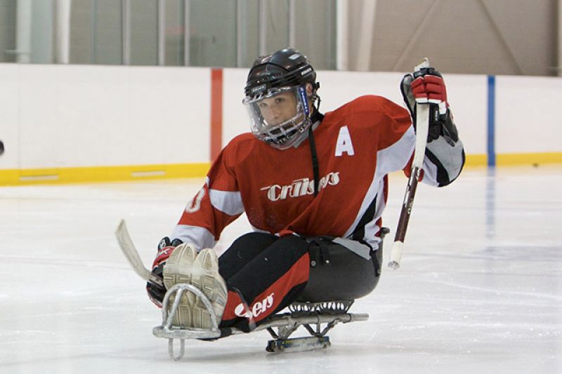 sled hockey player on ice