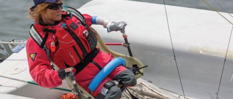 disabled sailor piloting a small sailboat